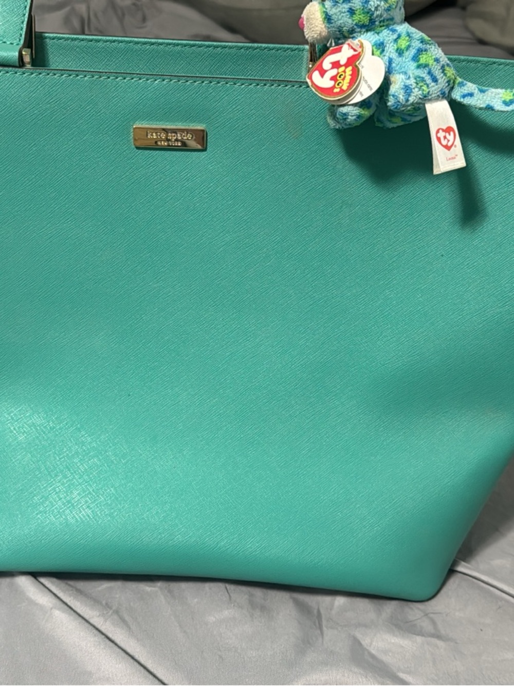 kate spade teal saffiano tote with gold logo